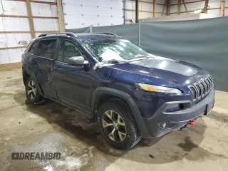 2014 Jeep Cherokee Trailhawk with VIN 1C4PJMBB9EW124371, listed as a Copart auction lot 42038105 with 137,717 mi miles and Salvage Title. Bid and sale history available at carsss.com. Image 4.