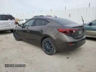 2014 Mazda 3 S Touring with VIN JM1BM1V31E1105847, listed as a Copart auction lot 50045925 with 121,538 mi miles and Salvage Title. Bid and sale history available at DreamBid. Image 2.