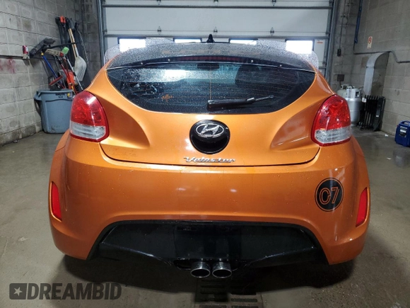 2012 Hyundai Veloster w/Gray Int z VIN KMHTC6AD4CU023265, wystawiony jako Copart lot #54959585 z przebiegiem 130 115 mil mil oraz Czysty tytuł • Clean title. Historia ofert i sprzedaży dostępna na DreamBid. Obrazek 6.