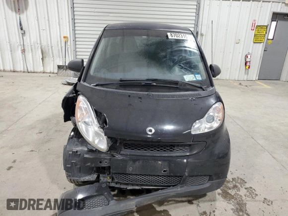 2011 Smart fortwo Pure с VIN WMEEJ3BA5BK480412, выставлен на аукционе Copart как лот 87023194 с пробегом 70 496 миль миль и Списание • Salvage title. История ставок и продаж доступна на DreamBid. Изображение 5.
