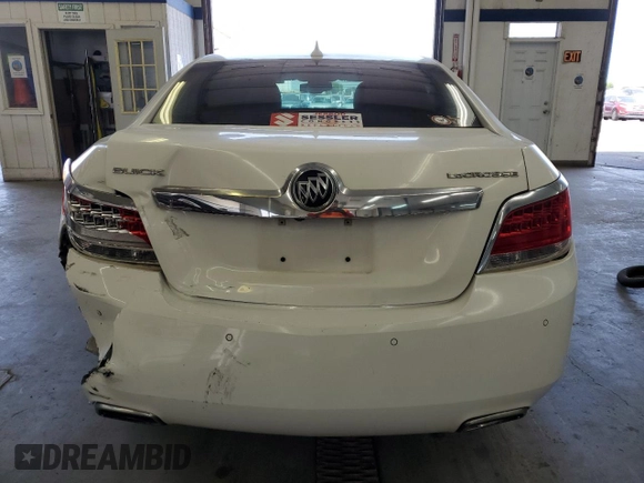 2013 Buick LaCrosse Leather с VIN 1G4GC5E39DF120383, выставлен на аукционе Copart как лот 60920775 с пробегом 124 044 миль миль и Списание • Salvage title. История ставок и продаж доступна на DreamBid. Изображение 6.