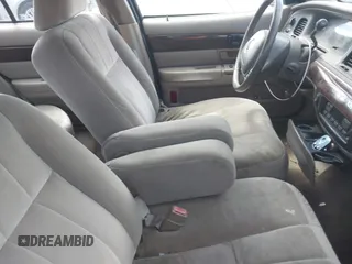 2003 Mercury Grand Marquis LS Premium z VIN 2MEFM75WX3X683205, wystawiony jako IAAI lot #42177139 z przebiegiem 200 521 mil mil oraz . Historia ofert i sprzedaży dostępna na DreamBid. Obrazek 5.