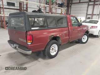 1999 Mazda B-Series Truck SX with VIN 4F4YR12C8XTM08476, listed as a IAAI auction lot 41864144 with 187,847 mi miles and . Bid and sale history available at DreamBid. Image 4.