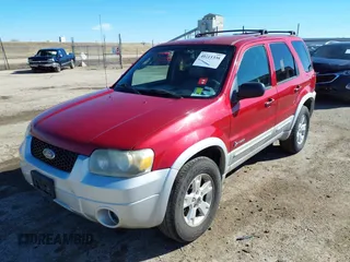 2005 Ford Escape Hybrid with VIN 1FMYU96H05KE01130, listed as a IAAI auction lot 41711338 with 288,964 mi miles. Bid and sale history available at carsss.com. Image 2.