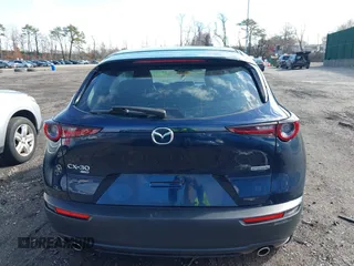 2023 Mazda CX-30 S with VIN 3MVDMBAM1PM583896, listed as a IAAI auction lot 41732091 with 26,298 mi miles and . Bid and sale history available at carsss.com. Image 16.