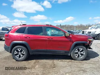 2015 Jeep Cherokee Trailhawk with VIN 1C4PJMBS0FW728361, listed as a IAAI auction lot 41978853 with 123,127 mi miles. Bid and sale history available at carsss.com. Image 13.