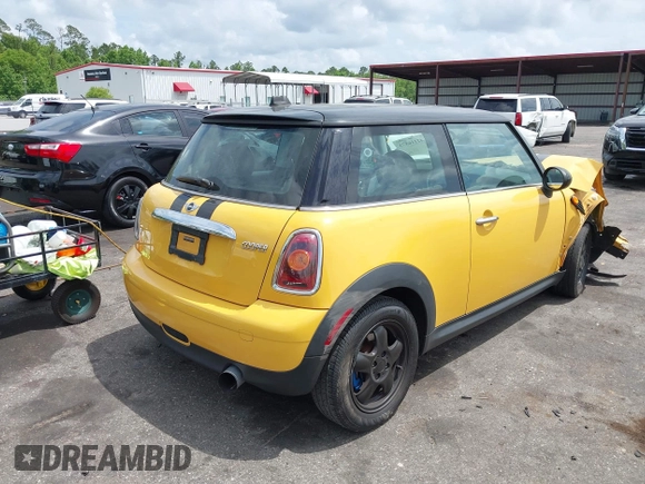 2009 MINI Hardtop with VIN WMWMF33579TT69729, listed as a IAAI auction lot 42116873 with 92,334 mi miles and . Bid and sale history available at DreamBid. Image 4.