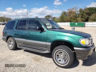 2000 Mercury Mountaineer z VIN 4M2ZU66P1YUJ05468, wystawiony jako Copart lot #75682513 z przebiegiem 211 748 mil mil oraz Szkoda całkowita • Salvage title. Historia ofert i sprzedaży dostępna na DreamBid. Obrazek 4.