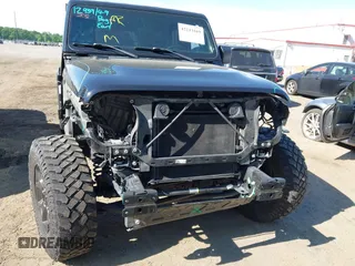 2021 Jeep Wrangler Unlimited Sport S with VIN 1C4HJXDNXMW646194, listed as a IAAI auction lot 42243169 with 44,237 mi miles and . Bid and sale history available at DreamBid. Image 12.