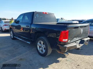 2014 Ram 1500 Tradesman with VIN 1C6RR6KT9ES112936, listed as a IAAI auction lot 41811778 with 147,654 mi miles. Bid and sale history available at carsss.com. Image 3.