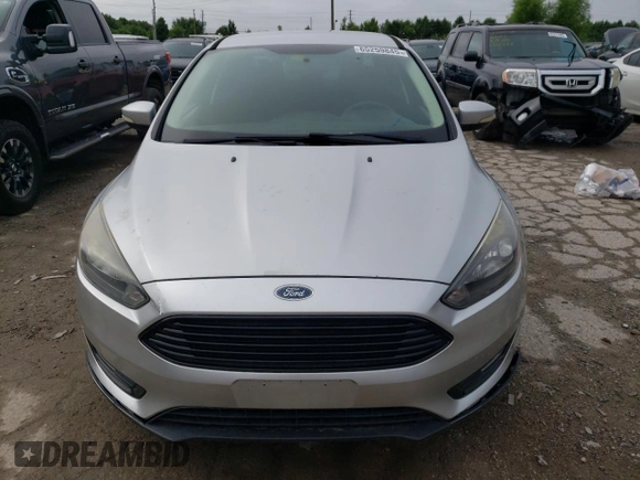 2017 Ford Focus SE with VIN 1FADP3FE2HL263592, listed as a Copart auction lot 65259845 with 74,413 mi miles and Clean title. Bid and sale history available at DreamBid. Image 5.