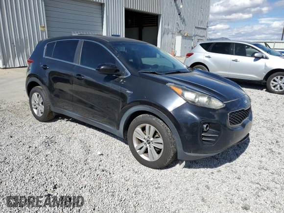 2018 Kia Sportage LX with VIN KNDPMCAC8J7316512, listed as a Copart auction lot 47143515 with 117,147 mi miles and Salvage Title. Bid and sale history available at DreamBid. Image 4.