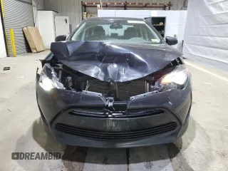 2019 Toyota Corolla L with VIN 2T1BURHE5KC185821, listed as a Copart auction lot 52613985 with 104,208 mi miles and Salvage title. Bid and sale history available at DreamBid. Image 5.