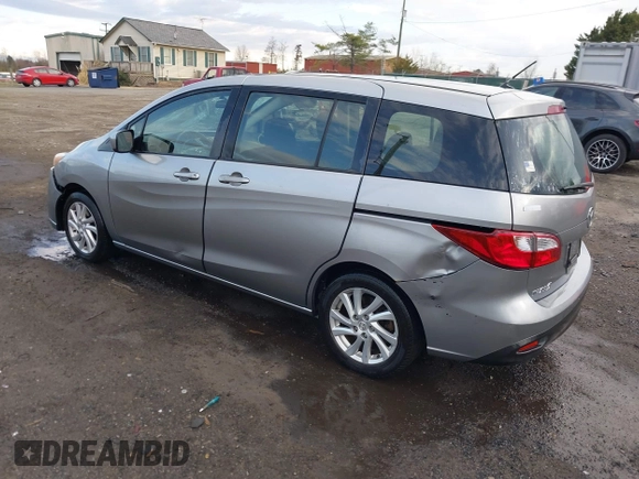 2012 Mazda 5 Sport with VIN JM1CW2BLXC0107933, listed as a IAAI auction lot 41813231 with 164,395 mi miles and . Bid and sale history available at DreamBid. Image 3.