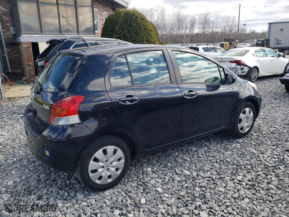 2009 Toyota Yaris with VIN JTDKT903395225334, listed as a Copart auction lot 50764035 with 117,561 mi miles and Clean Title. Bid and sale history available at carsss.com. Image 3.