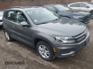 2017 Volkswagen Tiguan S with VIN WVGBV7AX5HK028788, listed as a IAAI auction lot 41699615 with 113,608 mi miles and . Bid and sale history available at DreamBid. Image 1.