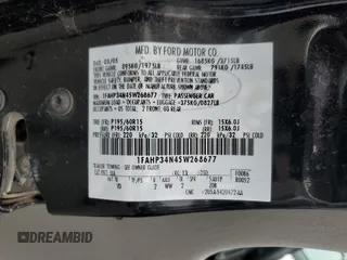 2005 Ford Focus S with VIN 1FAHP34N45W268677, listed as a Copart auction lot 51475915 with 100,397 mi miles and Salvage Title. Bid and sale history available at carsss.com. Image 14.