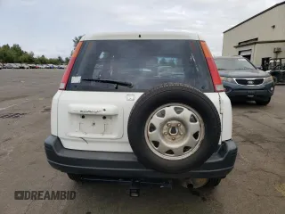 1999 Honda CR-V LX with VIN JHLRD2844XC019693, listed as a Copart auction lot 67787944 with 324,075 mi miles and Salvage Title. Bid and sale history available at carsss.com. Image 6.
