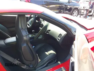2015 Chevrolet Corvette 1LT z VIN 1G1YA2D77F5122992, wystawiony jako IAAI lot #42386670 z przebiegiem 59 722 mil mil oraz . Historia ofert i sprzedaży dostępna na DreamBid. Obrazek 5.