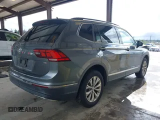 2018 Volkswagen Tiguan SEL with VIN 3VV3B7AX6JM054849, listed as a IAAI auction lot 42303112 with 87,574 mi miles and . Bid and sale history available at DreamBid. Image 4.