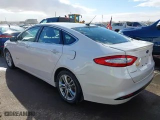 2015 Ford Fusion Titanium Hybrid with VIN 3FA6P0RU9FR308973, listed as a IAAI auction lot 41754320 with 82,686 mi miles. Bid and sale history available at carsss.com. Image 3.