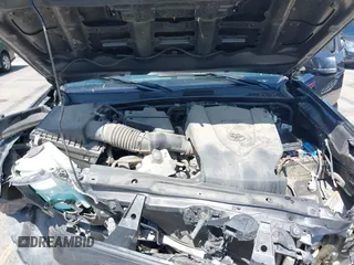 2021 Toyota Tacoma SR z VIN 5TFCZ5AN1MX274315, wystawiony jako IAAI lot #42273054 z przebiegiem 67 863 mil mil oraz . Historia ofert i sprzedaży dostępna na DreamBid. Obrazek 10.