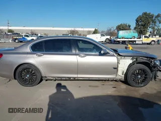 2015 BMW 7 Series 750Li with VIN WBAYE8C55FD782384, listed as a IAAI auction lot 41319363 with 75,784 mi miles. Bid and sale history available at carsss.com. Image 14.