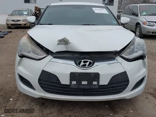 2014 Hyundai Veloster with VIN KMHTC6AD6EU211479, listed as a IAAI auction lot 41196275 with 132,337 mi miles. Bid and sale history available at carsss.com. Image 6.