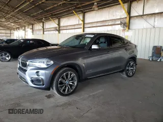 2015 BMW X6 xDrive35i with VIN 5UXKU2C59F0N77312, listed as a Copart auction lot 63591123 with 121,105 mi miles. Bid and sale history available at carsss.com. Image 1.