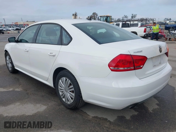 2014 Volkswagen Passat S with VIN 1VWAS7A34EC120855, listed as a IAAI auction lot 42134586 with 61,825 mi miles and . Bid and sale history available at DreamBid. Image 3.
