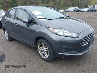 2019 Ford Fiesta SE z VIN 3FADP4BJ6KM120398, wystawiony jako IAAI lot #42144454 z przebiegiem 79 350 mil mil oraz . Historia ofert i sprzedaży dostępna na DreamBid. Obrazek 1.