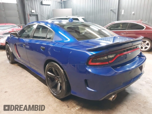 2022 Dodge Charger R/T with VIN 2C3CDXCT9NH127952, listed as a IAAI auction lot 42020401 with 55,483 mi miles and . Bid and sale history available at carsss.com. Image 3.
