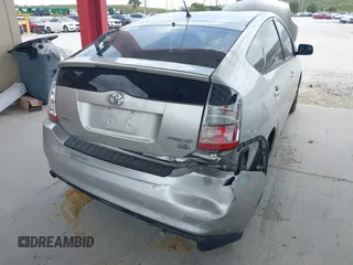 2004 Toyota Prius with VIN JTDKB20U140075930, listed as a IAAI auction lot 41712770 with 219,930 mi miles. Bid and sale history available at carsss.com. Image 6.