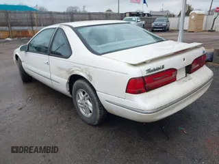 1997 Ford Thunderbird LX with VIN 1FALP62W6VH124267, listed as a IAAI auction lot 41439934 with 242,914 mi miles and . Bid and sale history available at DreamBid. Image 3.