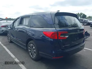 2022 Honda Odyssey EX-L with VIN 5FNRL6H70NB053843, listed as a IAAI auction lot 40210685 with 21,571 mi miles and . Bid and sale history available at DreamBid. Image 3.