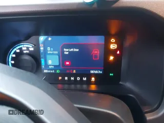 2023 Ford Bronco z VIN 1FMEE5DP3PLB33884, wystawiony jako IAAI lot #41202669 z przebiegiem 58 749 mil mil oraz . Historia ofert i sprzedaży dostępna na DreamBid. Obrazek 7.