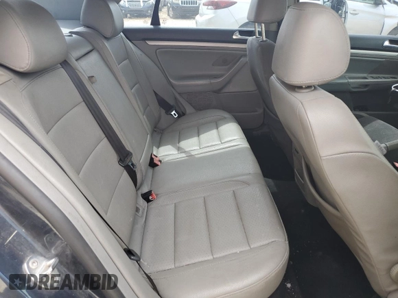 2008 Volkswagen Jetta SE z VIN 3VWRM71K98M082885, wystawiony jako Copart lot #57521515 z przebiegiem 162 641 mil mil oraz Szkoda całkowita • Salvage title. Historia ofert i sprzedaży dostępna na DreamBid. Obrazek 10.