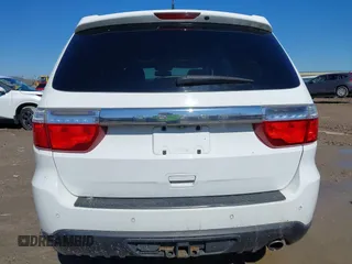 2013 Dodge Durango Citadel z VIN 1C4RDJEG6DC638023, wystawiony jako IAAI lot #41761307 z przebiegiem 405 864 mil mil oraz . Historia ofert i sprzedaży dostępna na DreamBid. Obrazek 16.