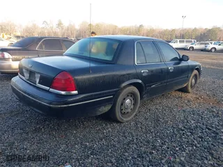 2005 Ford Crown Victoria LX with VIN 2FAFP74W45X127975, listed as a IAAI auction lot 41521670 with 289,438 mi miles. Bid and sale history available at carsss.com. Image 4.