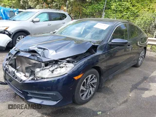 2016 Honda Civic EX with VIN 19XFC2F7XGE057647, listed as a IAAI auction lot 42016303 with 157,106 mi miles. Bid and sale history available at carsss.com. Image 2.