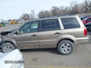 2005 Honda Pilot EX-L z VIN 2HKYF18665H523484, wystawiony jako IAAI lot #41697429 z przebiegiem 294 241 mil mil oraz . Historia ofert i sprzedaży dostępna na DreamBid. Obrazek 14.