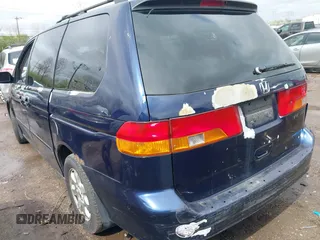2004 Honda Odyssey EX-L with VIN 5FNRL189X4B045588, listed as a IAAI auction lot 41928397 with 218,182 mi miles and . Bid and sale history available at DreamBid. Image 3.