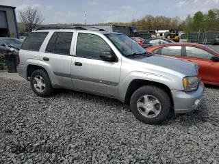 2004 Chevrolet TrailBlazer LS with VIN 1GNDT13SX42330807, listed as a Copart auction lot 55117785 with 178,580 mi miles and Salvage Title. Bid and sale history available at DreamBid. Image 4.