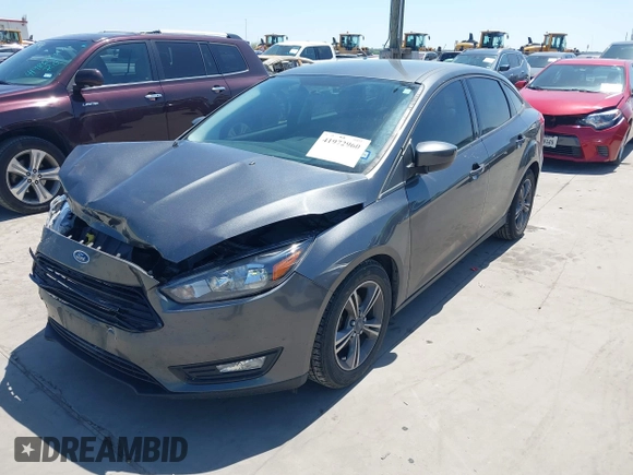 2018 Ford Focus SE with VIN 1FADP3FE3JL204220, listed as a IAAI auction lot 41972960 with 62,682 mi miles and . Bid and sale history available at DreamBid. Image 20.