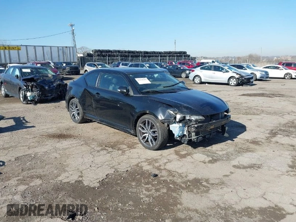 2014 Scion tC with VIN JTKJF5C78E3074094, listed as a IAAI auction lot 41828785 with 164,976 mi miles. Bid and sale history available at carsss.com. Image 1.