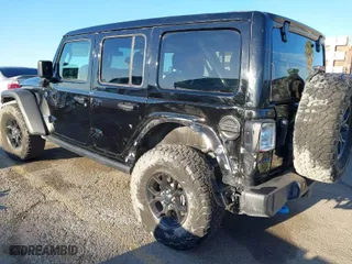 2024 Jeep Wrangler 4xe Willys with VIN 1C4RJXN6XRW215633, listed as a IAAI auction lot 41861641 with 3,927 mi miles. Bid and sale history available at carsss.com. Image 3.
