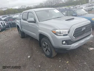 2019 Toyota Tacoma 4WD SR with VIN 3TMCZ5AN1KM206969, listed as a IAAI auction lot 41951159 with 94,875 mi miles. Bid and sale history available at carsss.com. Image 1.