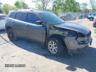 2016 Jeep Cherokee Latitude z VIN 1C4PJLCB5GW264607, wystawiony jako IAAI lot #42275637 z przebiegiem 64 264 mil mil oraz . Historia ofert i sprzedaży dostępna na DreamBid. Obrazek 1.