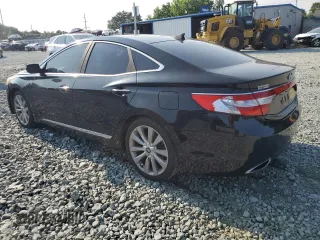 2013 Hyundai Azera с VIN KMHFH4JG2DA266282, выставлен на аукционе Copart как лот 59156175 с пробегом 135 013 миль миль и Списание • Salvage title. История ставок и продаж доступна на DreamBid. Изображение 2.