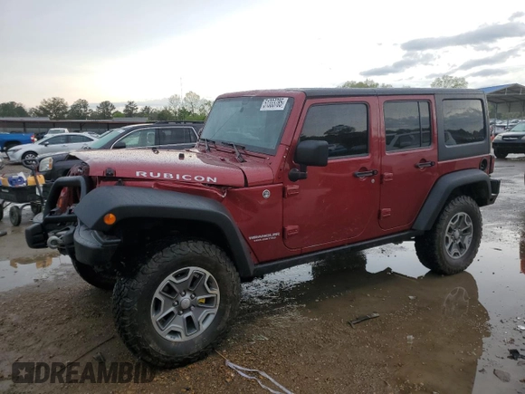 2013 Jeep Wrangler Unlimited Rubicon with VIN 1C4HJWFG6DL565462, listed as a Copart auction lot 51333785 with 113,601 mi miles and Salvage title. Bid and sale history available at DreamBid. Image 1.